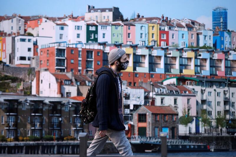 A man wearing a protective face mask is seen in Bristol. Reuters