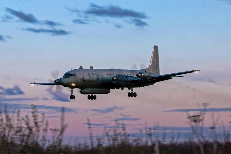 A photo taken on July 23, 2006 shows an Russian IL-20M (Ilyushin 20m) plane landing at an unknown location. Russia blamed Israel on September 18, 2018 for the loss of a military IL-20M jet to Syrian fire, which killed all 15 servicemen on board, and threatened a response. Israeli pilots carrying out attacks on Syrian targets "used the Russian plane as a cover, exposing it to fire from Syrian air defences," a statement by the Russian military said.
 / AFP / Nikita SHCHYUKIN
