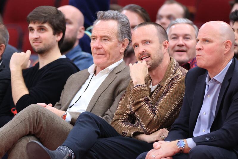 'Breaking Bad' series stars Aaron Paul and Bryan Cranston attend the game between Houston Rockets and Charlotte Hornets at Toyota Centre in Houston, Texas. AFP