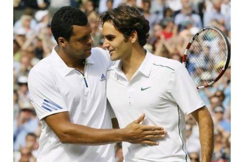 A reader is disappointed by Roger Federer's Wimbledon loss, saying he thinks the player gave up. Kirsty Wigglesworth / AP