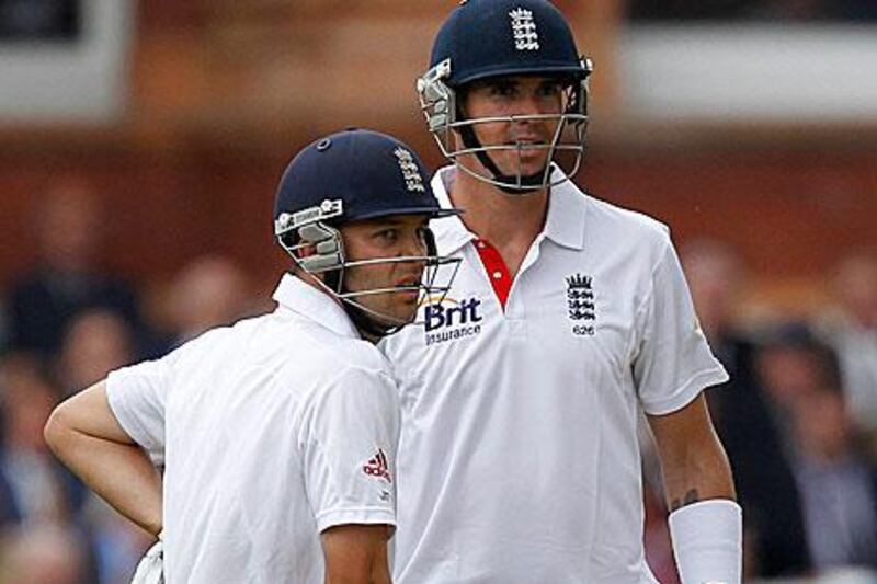 Jonathan Trott, left, and Kevin Pietersen were involved in an unbroken 65-run stand yesterday.