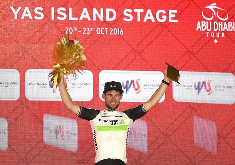 Mark Cavendish of Great Britain and Team Dimension Data celebrates on the podium. Tom Dulat / Getty Images