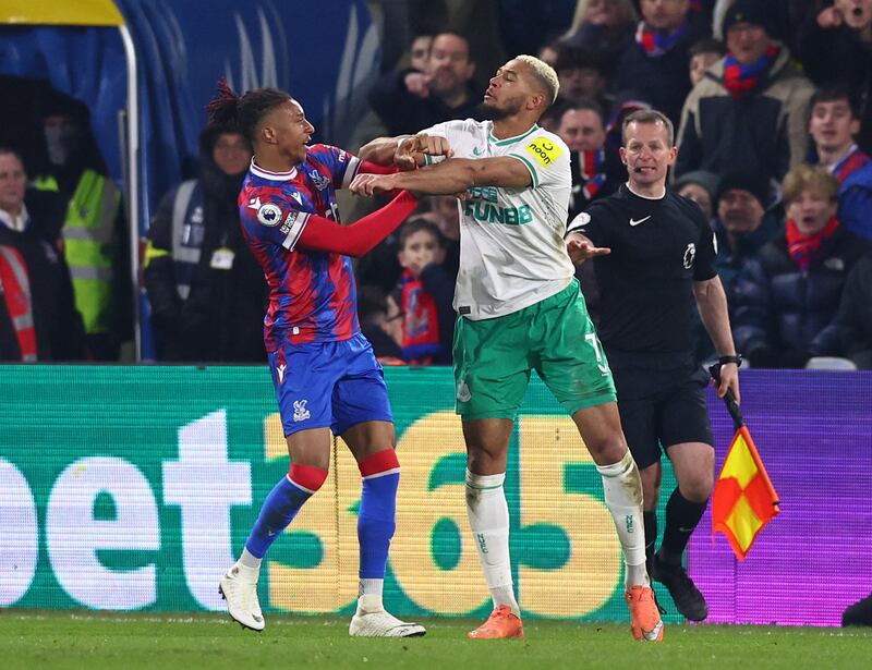 Newcastle's Joelinton clashes with Crystal Palace's Michael Olise. Reuters