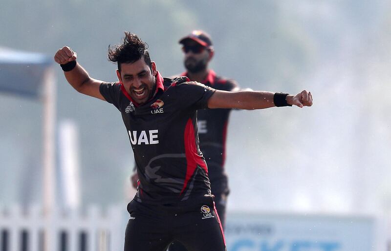 ABU DHABI , UNITED ARAB EMIRATES , October 22  – 2019 :- Zahoor Khan of UAE celebrating after taking the wicket of Jonty Jenner during the World Cup T20 Qualifiers between UAE vs Jersey held at Tolerance Oval cricket ground in Abu Dhabi.  ( Pawan Singh / The National )  For Sports. Story by Paul