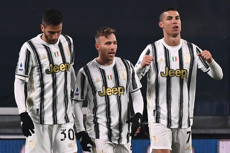 Left to right: Rodrigo Bentancur, Arthur and Cristiano Ronaldo. AFP