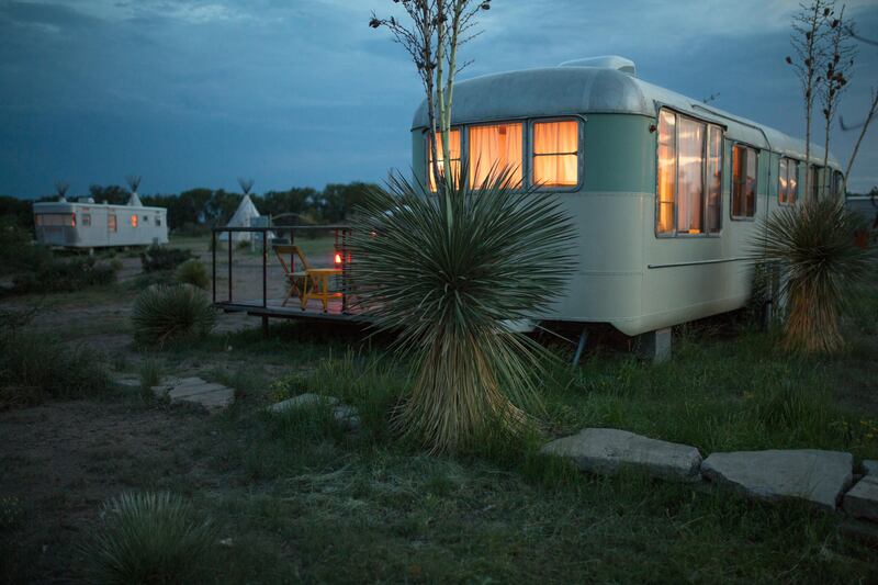 Trailer and teepee camping at night at The El Cosmico campground in Marfa, Texas in 2014