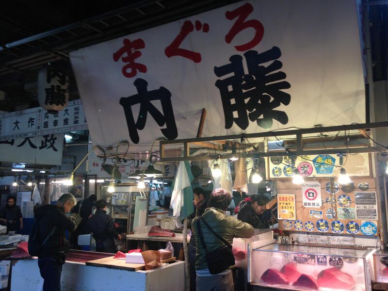 Tsukiji Fish Market in Tokyo was - until it closed on October 6 - the world's largest wholesale fish and seafood market. Freezing cold and wet, it became an unlikely tourist attraction. Declan McVeigh/The National