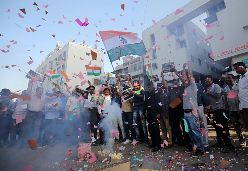 People celebrate before the release of Indian Air Force pilot, who was captured by Pakistan on Wednesday, in a street in Ahmedabad, India, March 1, 2019. Reuters