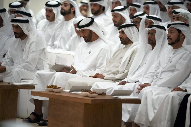 ABU DHABI, UNITED ARAB EMIRATES - May 21, 2018: HH Sheikh Mohamed bin Zayed Al Nahyan Crown Prince of Abu Dhabi Deputy Supreme Commander of the UAE Armed Forces (4th R), HH Sheikh Ahmed bin Saif bin Mohamed Al Nahyan (3rd R), HE Dr Mana Saeed Al Otaiba, former UAE Minister of Petroleum and Mineral Resources (R) and HH Sheikh Nahyan Bin Zayed Al Nahyan, Chairman of the Board of Trustees of Zayed bin Sultan Al Nahyan Charitable and Humanitarian Foundation (L), attend a lecture by Omar Habtoor Al Darei titled "Reclaiming Religion In The Age of Extremism", at Majlis Mohamed bin Zayed. Seen with 

( Hamad Al Kaabi / Crown Prince Court - Abu Dhabi )
---