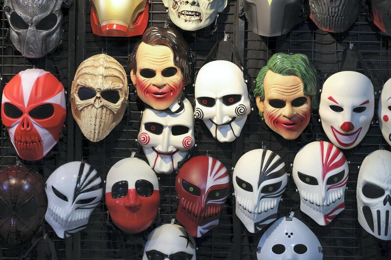 Dubai, United Arab Emirates - April 11, 2019: Film masks on display. Visitors dress up as the visit Middle East Film and Comic Con. Thursday the 11th of April 2019. World Trade Centre, Dubai. Chris Whiteoak / The National