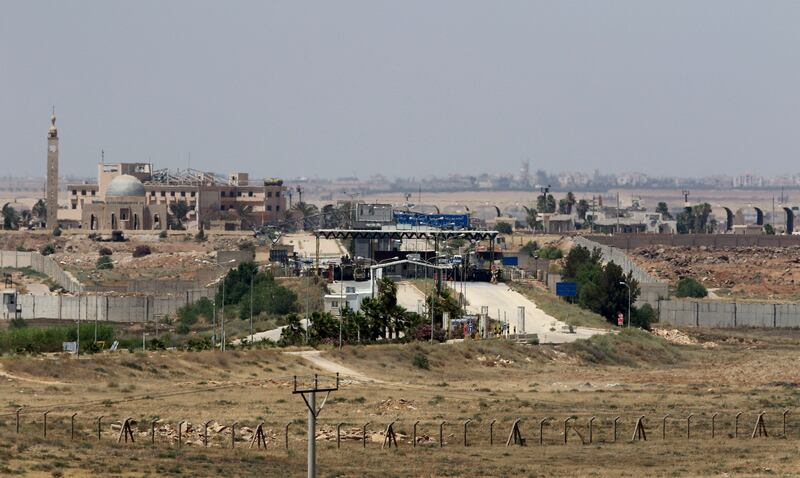 A general view taken from the Jordanian Mafraq governate on July 7, 2018, shows  a border crossing with Syria. AFP