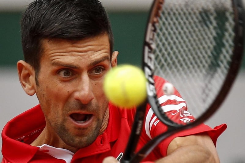 Novak Djokovic of Serbia defeated Lithuania's Ricardas Berankis 6-1, 6-4, 6-1 at Roland Garros. EPA