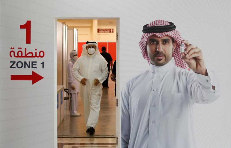 A Bahraini man leaves after he received dose of a coronavirus disease (COVID-19) vaccine, at Bahrain International Exhibition & Convention Centre (BIECC), in Manama, Bahrain December 24, 2020. REUTERS/Hamad I Mohammed