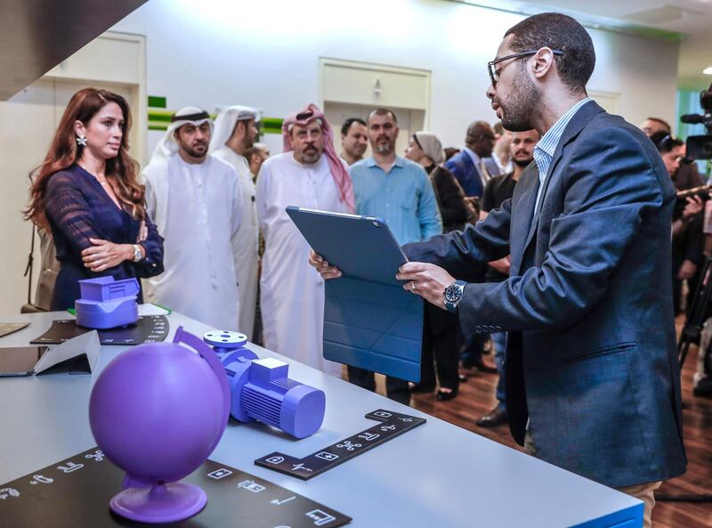 Abu Dhabi, United Arab Emirates, June 20, 2019.   5G Technology presented by Etisalat ant Ericsson. --  An Etisalat representative explains Industry 4.0 Augmented Reality to the visitors of the event.
Victor Besa/The National
Section:  BZ
Reporter:  Sarah Townsend