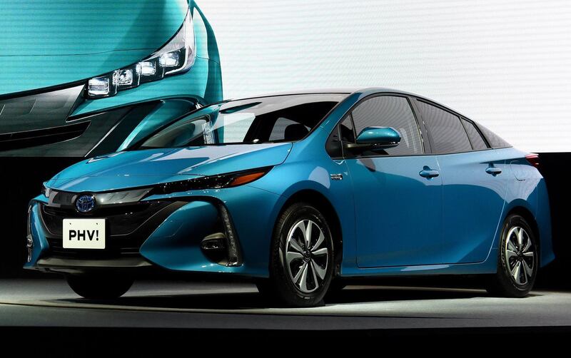 (FILES) This file photo taken on February 15, 2017 shows redesigned Toyota Prius PHV (plug-in hybrid vehicle) during a press conference in Tokyo. Japanese car giant Toyota said on October 5, 2018 it is recalling more than 2.4 million hybrid cars over a fault that could cause crashes, just a month after an another recall affecting hybrids. - 
 / AFP / TORU YAMANAKA
