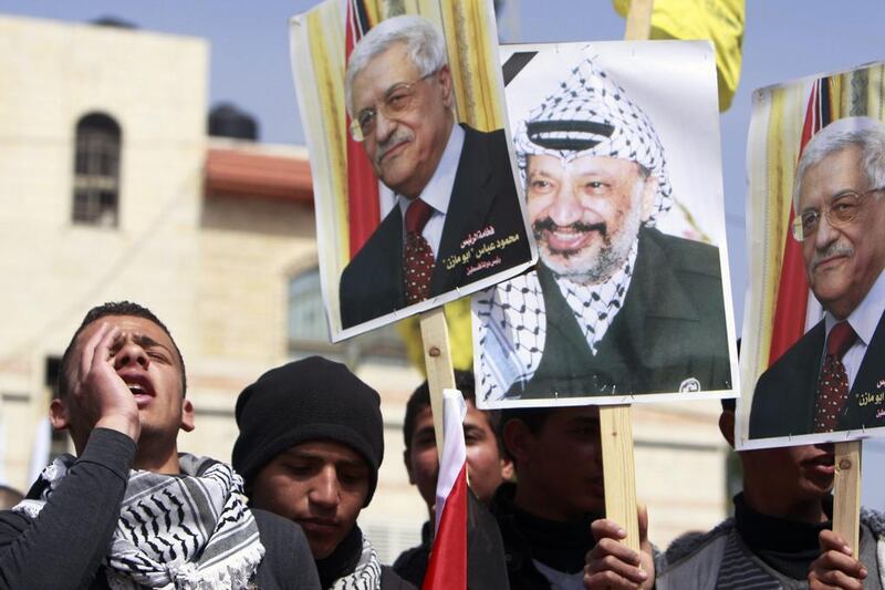 Palestinians in the West Bank town of Tubas on March 16 shout slogans in support of Palestinian Authority president Mahmoud Abbas, calling him "Abu Mazen," his local name, ahead of his meeting with US president Barack Obama. Mohammed Ballas/AP