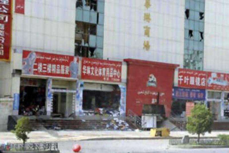 Hualin Market in Kuqa County, in Xinjiang after an attack on Aug 10, 2008. Witnesses said they saw people hurl explosives from inside a taxi at several government and commercial offices.