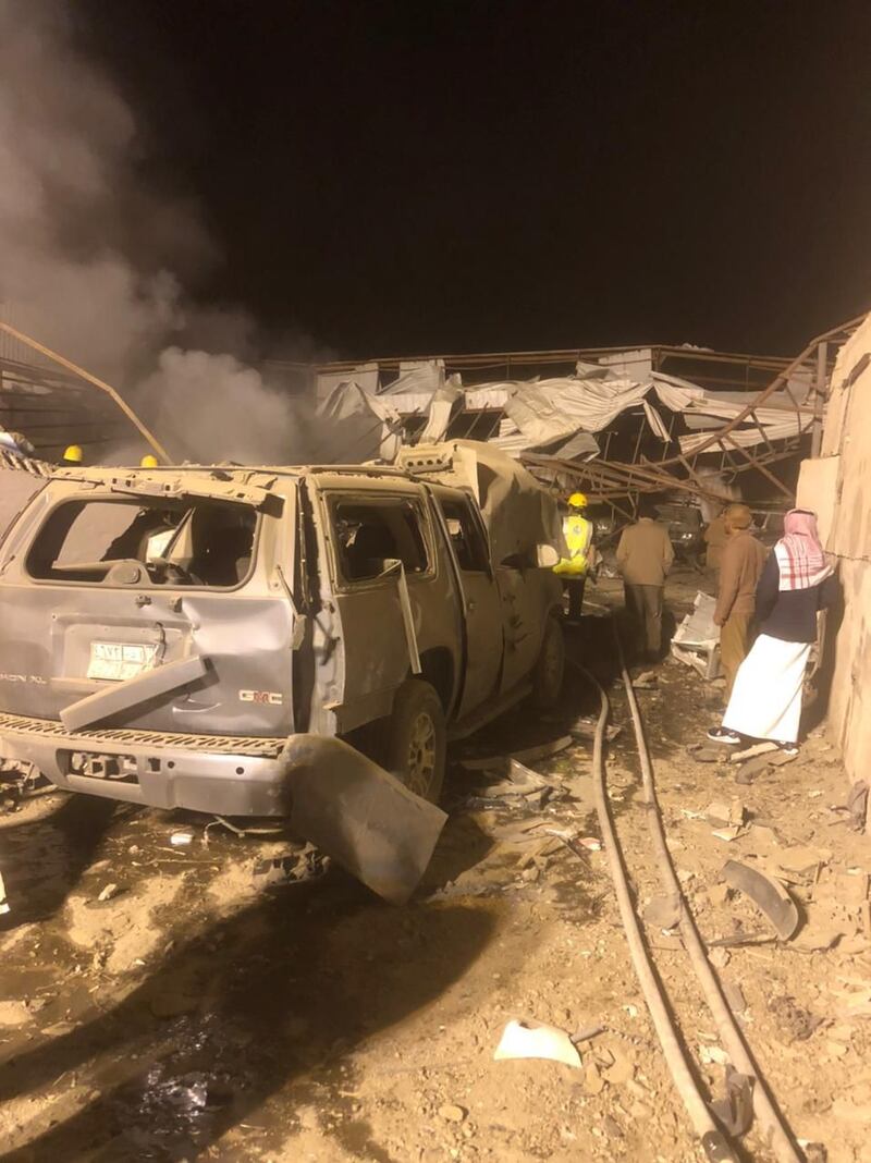 Cars and buildings damaged by debris from the intercepted Houthi ballistic missile that landed in an industrial area in Dhahran Al Janub, Saudi Arabia. Photo: Saudi Press Agency