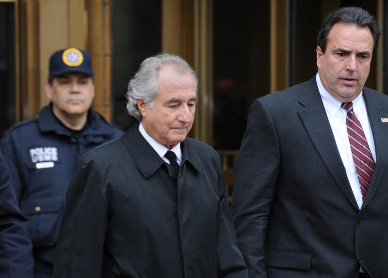 Disgraced Wall Street financier Bernard Madoff leaves US Federal Court after a hearing on March 10, 2009 in New York. Madoff has agreed to plead guilty to 11 counts of fraud, his lawyer said in court.   AFP PHOTO/Stan HONDA (Photo by STAN HONDA / AFP)