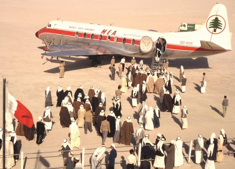 Dubai International Airport celebrated its 60th anniversary in 2020. Here passengers board a plane parked on a sand compacted runway in the 1960s. All photos: Dubai Airports