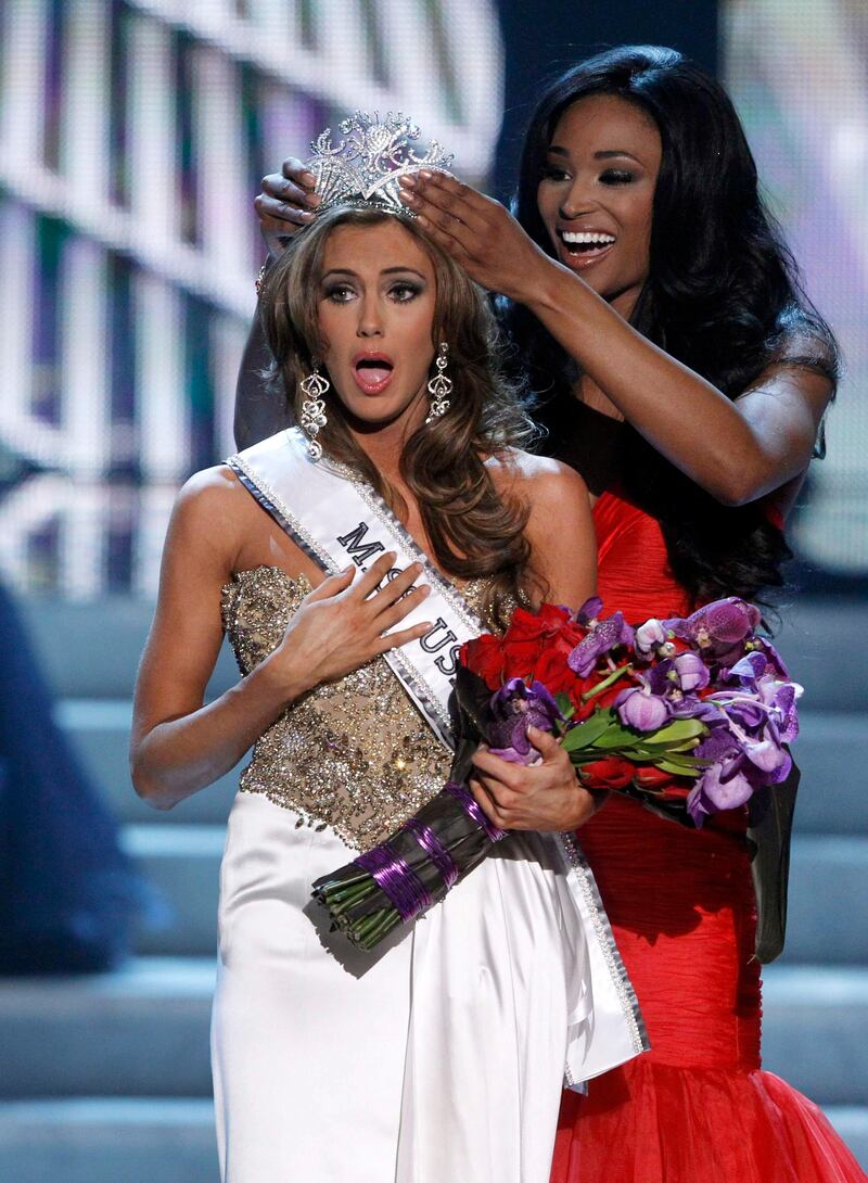 Miss Connecticut Erin Brady reacts as she is crowned by Miss USA 2012 Nana Meriwether during the Miss USA pageant at the Planet Hollywood Resort and Casino in Las Vegas, Nevada June 16, 2013. REUTERS/Steve Marcus (UNITED STATES - Tags: ENTERTAINMENT) FOR EDITORIAL USE ONLY. NOT FOR SALE FOR MARKETING OR ADVERTISING CAMPAIGNS *** Local Caption ***  LAV28_USA-_0617_11.JPG