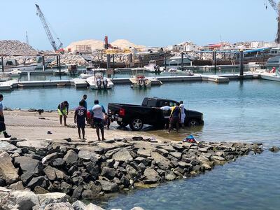 The SUV was winched back ashore. Courtesy: Dubai Police