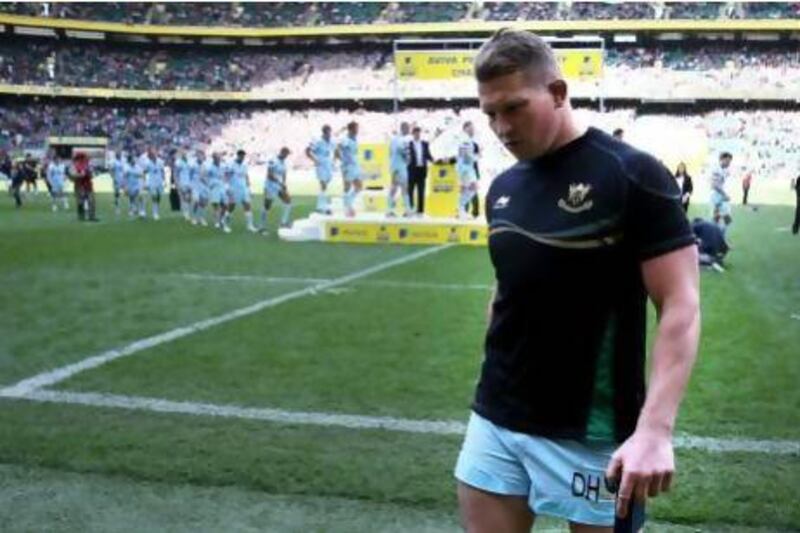 A dejected Dylan Hartley of Northampton walks off the pitch after collecting his losers medals during the Aviva Premiership Final between Leicester Tigers and Northampton Saints at Twickenham Stadium last month. David Rogers / Getty Images