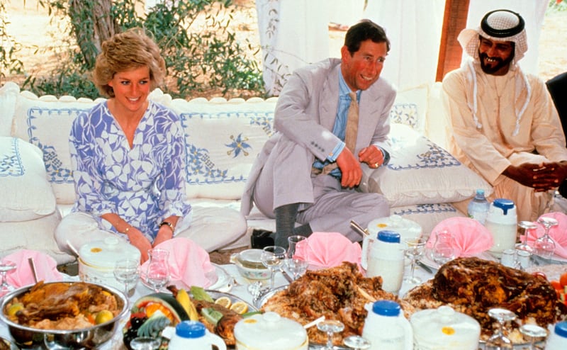Prince Charles and Diana, Princess of Wales, sit on cushions with Nahyan bin Mubarak, chancellor of the UAE University, near Al Ain on March 15, 1989. All photos: Getty Images