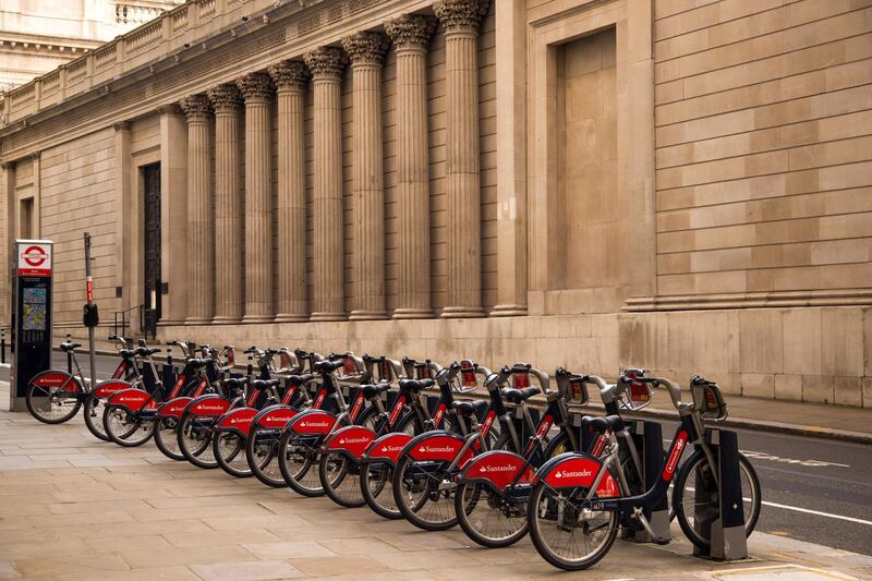 A rack of Santader hire bikes outside the Bank of England in the City of London, U.K., on Monday, March 8, 2021. Values in the U.K. capital should jump about 25% over the next five years, outpacing other European capitals, according to DWS researchers. Photographer: Jason Alden/Bloomberg