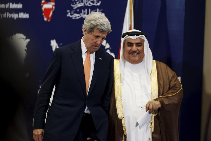 John Kerry with Bahrain's foreign minister, Sheikh Khalid bin Ahmed Al Khalifa, in Manama. Hamad I Mohammed / Reuters
