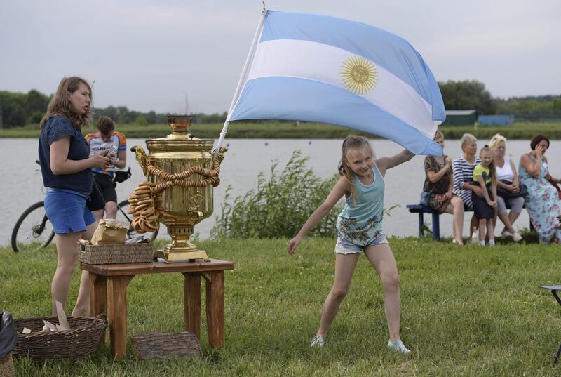 People attend the party organised by the town of Bronnitsy, the location of Argentina's base camp, near Moscow. AFP