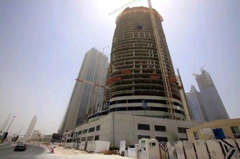 Damac is putting the finishing touches on the interiors of the Park Towers apartments. The project was reportedly scheduled to be finished by 2008. Jeffrey E Biteng / The National