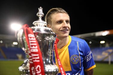 Soccer Football - FA Cup Fourth Round - Shrewsbury Town v Liverpool - Montgomery Waters Meadow, Shrewsbury, Britain - January 26, 2020 Shrewsbury Town's Jason Cummings poses next to the FA cup trophy after the match Action Images via Reuters/Carl Recine