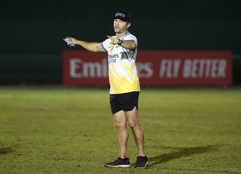 Dubai Hurricanes head coach Henry Paul issues instructions to his players. 