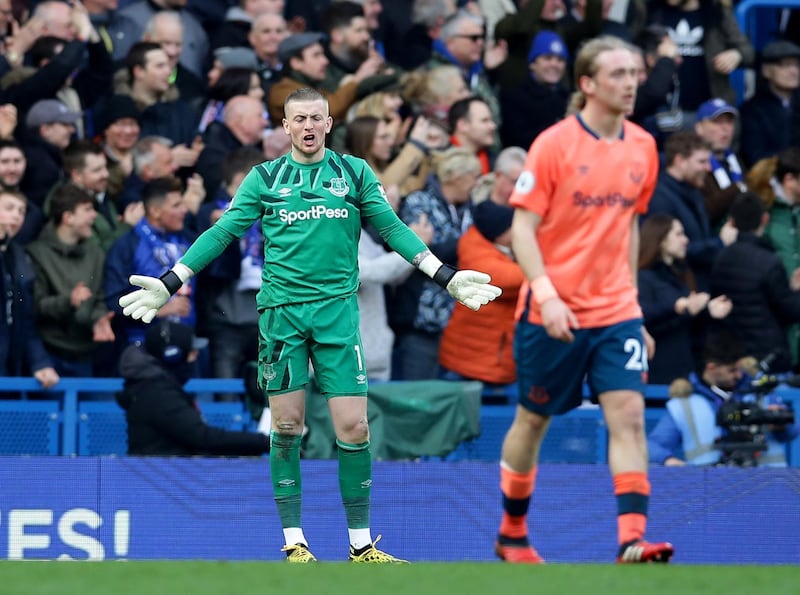 Everton goalkeeper Jordan Pickford after Chelsea's third goal scored by Willian. Reuters