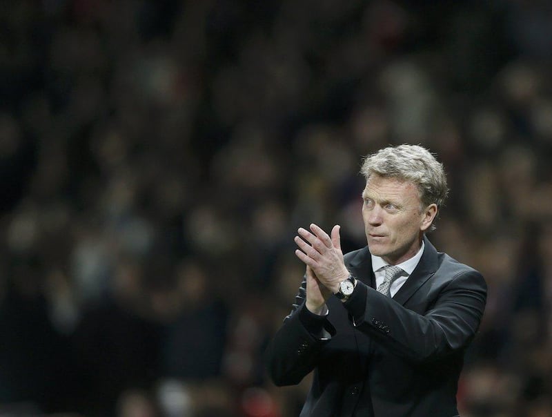 Manchester United manager David Moyes applauds supporters after their Champions League quarter-final first leg, 1-1 draw against Bayern Munich at Old Trafford on Tuesday night. Stefan Wermuth / Reuters / April 1, 2014    