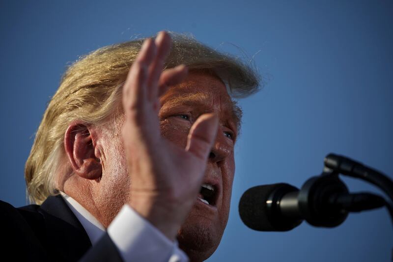 US President Donald Trump speaks during a campaign rally at Tucson International Airport in Tucson, Arizona. REUTERS