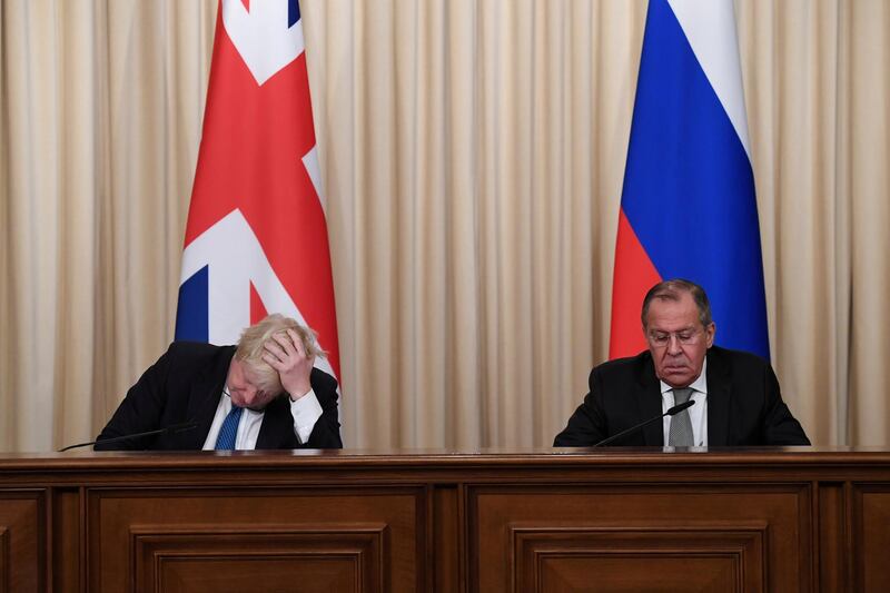 Britain's Foreign Secretary Boris Johnson and his Russian counterpart Sergei Lavrov hold a joint news conference following their meeting, in Moscow, Russia December 22, 2017. REUTERS/Stefan Rousseau/Pool     TPX IMAGES OF THE DAY
