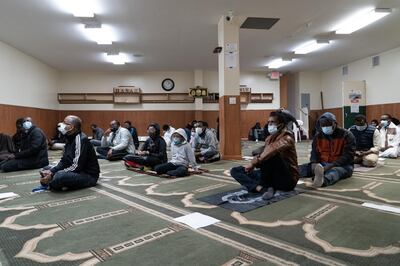 Worshippers attend a meeting during Ramadan at the Da'wah Mosque in St Paul, Minnesota. Willy Lowry / The National