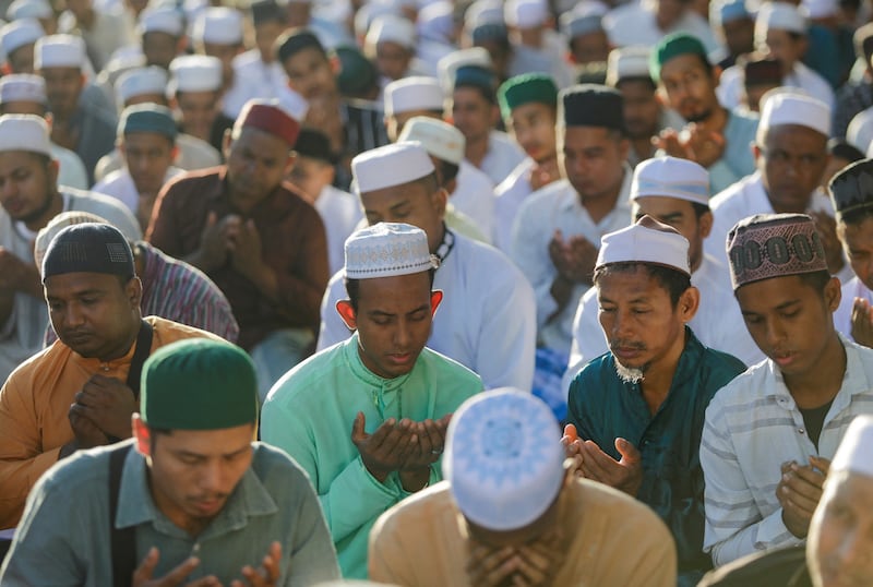 Eid worshippers pray in Kuala Lumpur. Reuters
