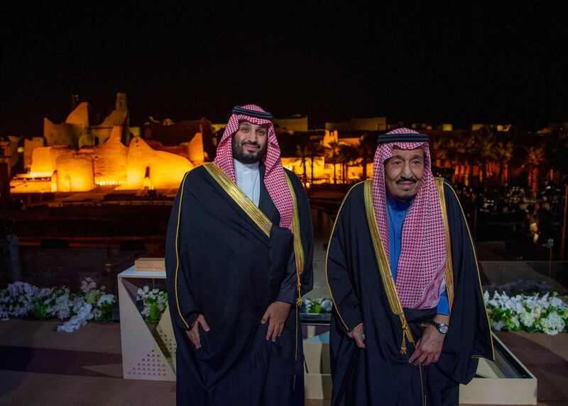 epa08014220 A handout photograph made available by the Saudi Royal Palace shows Saudi Arabia's King Salman bin Abdulaziz Al Saud (R) and Crown Prince Mohammed bin Salmanposing for a photograph during the inauguration of the Diriyah Gate, in Riyadh, Saudi Arabia, early 21 November 2019. According to local media reports, Diriyah gate is Saudi Arabia's First Cultural and Lifestyle Giga Project, with at its heart a UNESCO heritage site a restored 18th century adobe city that once served as the capital of the first Saudi State.  EPA/BANDAR ALJALOUD HANDOUT  HANDOUT EDITORIAL USE ONLY/NO SALES