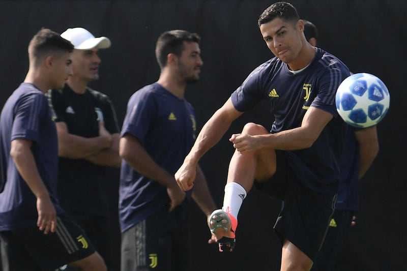 Cristiano Ronaldo kicks the ball during training with his Juventus teammates. AFP