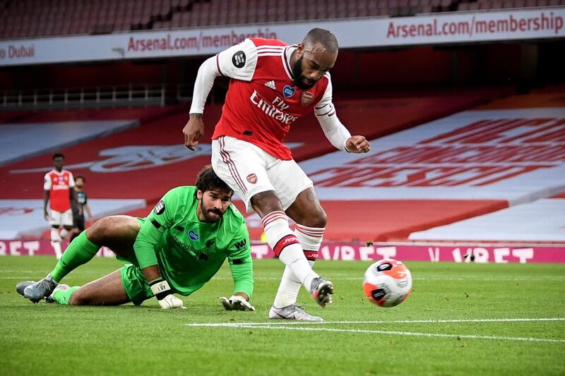 Arsenal's Alexandre Lacazette scores the equaliser. EPA