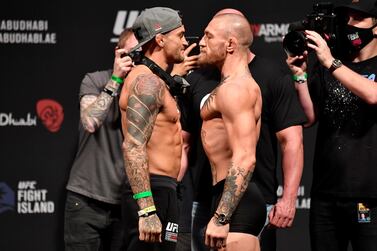 Dustin Poirier and Conor McGregor face off during the UFC 257 weigh-in in Abu Dhabi in January. USA Today