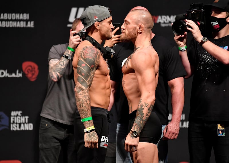 FILE PHOTO: Jan 22, 2021; Abu Dhabi, UNITED ARAB EMIRATES;   Dustin Poirier and Conor McGregor of Ireland face off during the UFC 257 weigh-in at Etihad Arena on UFC Fight Island on January 22, 2021 in Abu Dhabi, United Arab Emirates. Mandatory Credit: Jeff Bottari/Handout Photo via USA TODAY Sports/File Photo