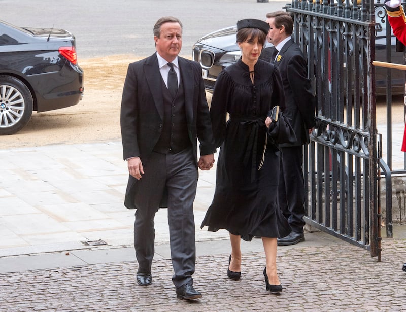 Former British prime minister David Cameron and his wife, Samantha Cameron, arrive for the funeral of Queen Elizabeth II. AP