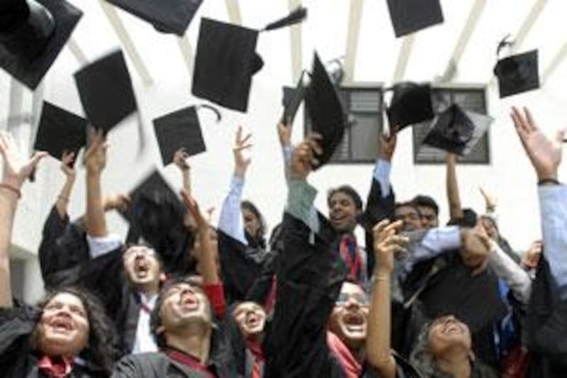 The graduating class of a university in Hyderabad throw their caps into the air. A reader suggests that the UAE offer scholarships and incentives to Indian specialists in maths and science.