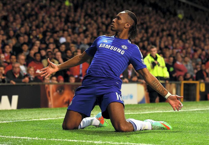 MANCHESTER, ENGLAND - OCTOBER 26:  Didier Drogba of Chelsea celebrates scoring the first goal during the Barclays Premier League match between Manchester United and Chelsea at Old Trafford on October 26, 2014 in Manchester, England.  (Photo by Laurence Griffiths/Getty Images)