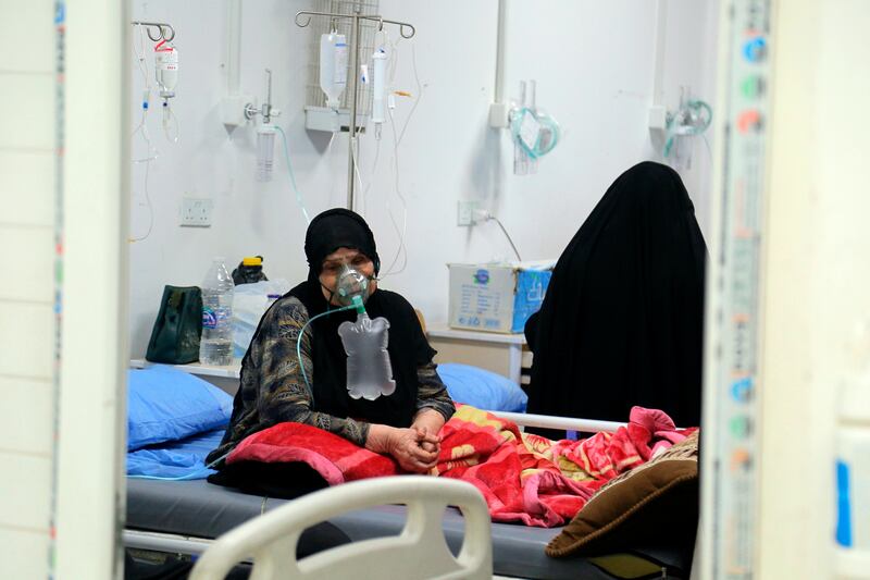 Coronavirus patients receive treatment at a hospital in Najaf, Iraq