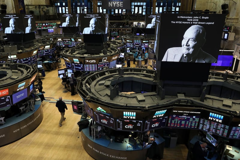 Screens display a tribute to Jack Bogle, founder and retired CEO of The Vanguard Group, on the floor of the New York Stock Exchange (NYSE) in New York, U.S., January 17, 2019. REUTERS/Brendan McDermid